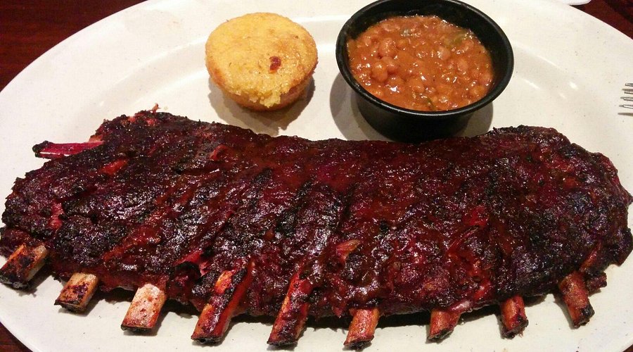 Dinosaur Bar-B-Que signature dishes Big Ass Pork Plate, Tres Hombres (pork, brisket, ribs), Dino Burger